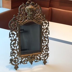 Vintage ornate antique gold mirror